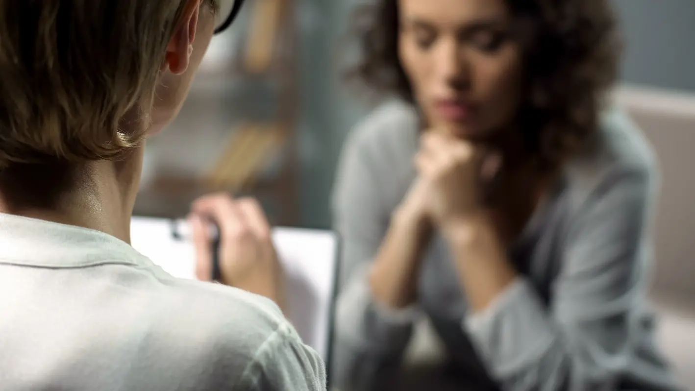 Young woman in therapy and counseling